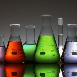 Conical flasks with coloured liquid