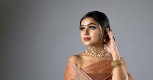 Beautiful woman in a Sari with brown lipstick