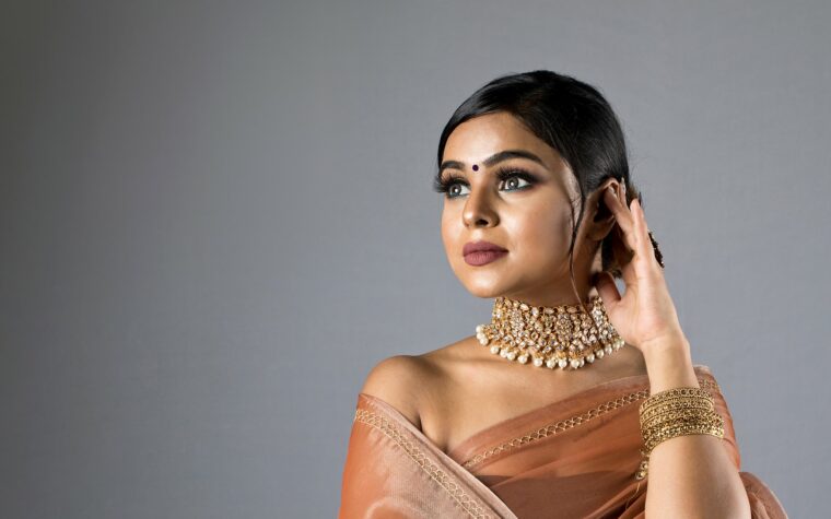 Beautiful woman in a Sari with brown lipstick